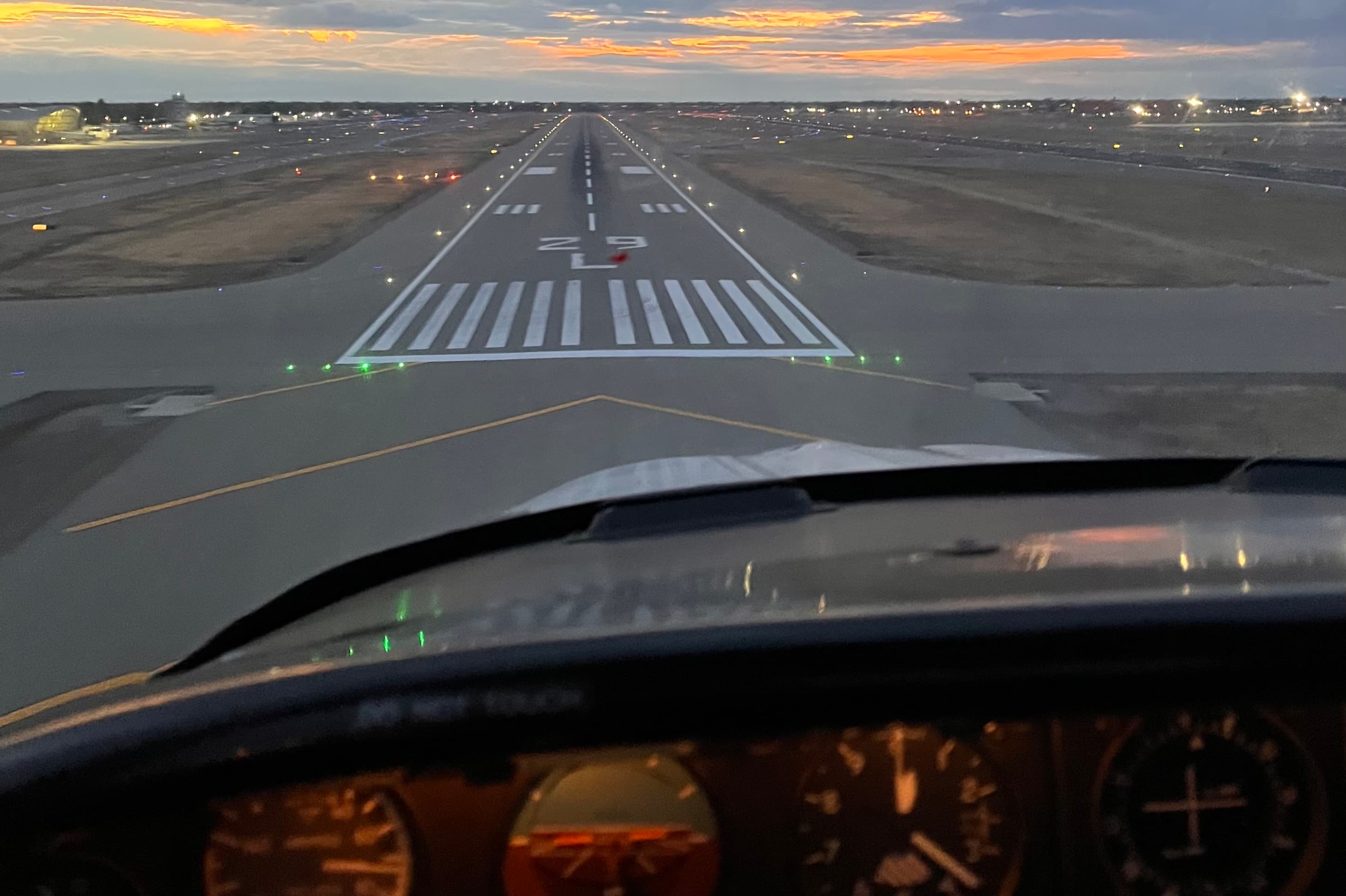Landing approach at KFAT Fresno Yosemite International Airport at dusk